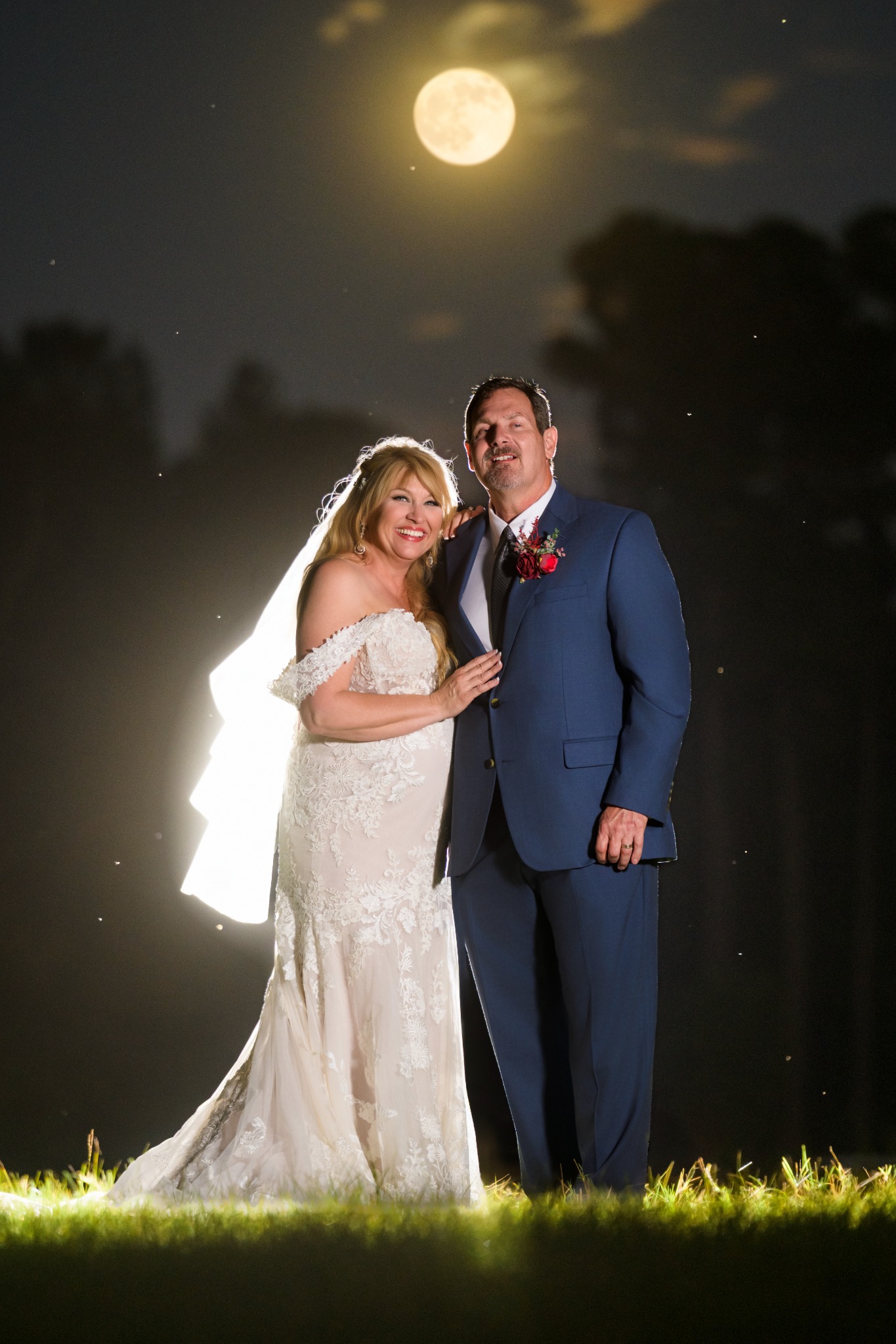 Newlyweds photographed beneath a full moon at Wildhorse at Parker Farms